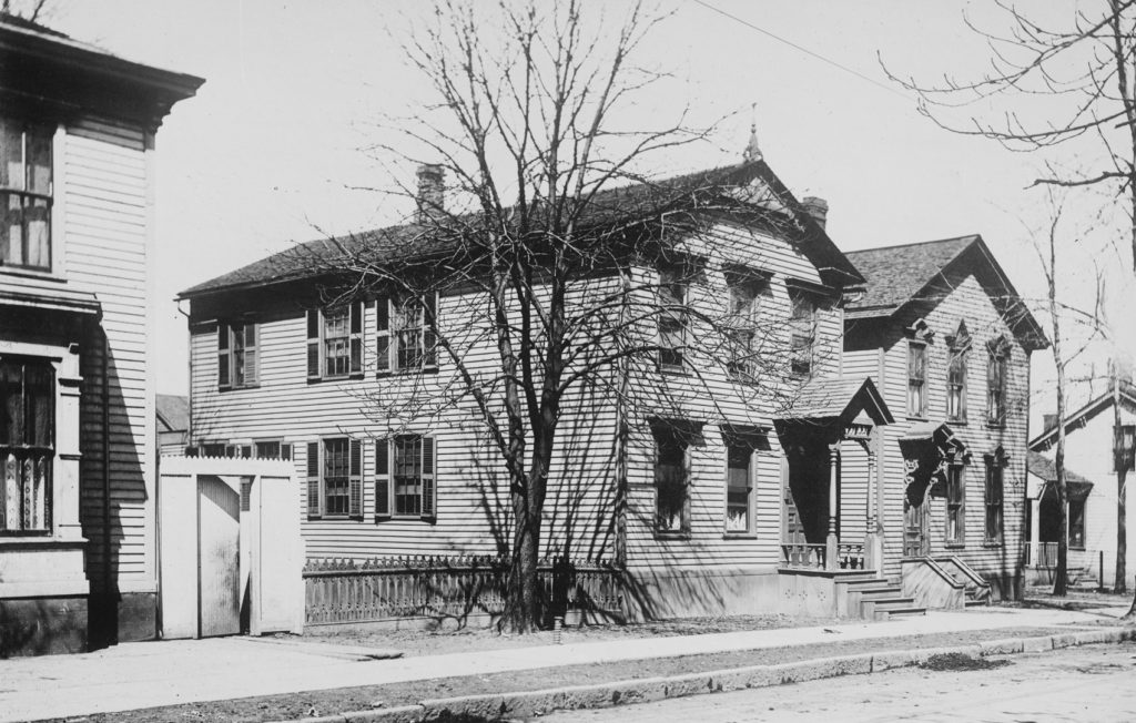 Two 2-story clapboard houses.